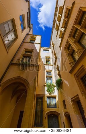 Old medieval courtyard Traboules in Lyon France - travel and architecture background