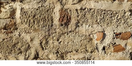 Vintage Turkish Brick Wall. The Restored Wall Of The Turkic Conquerors. Warm Brown-red Shades Of Une