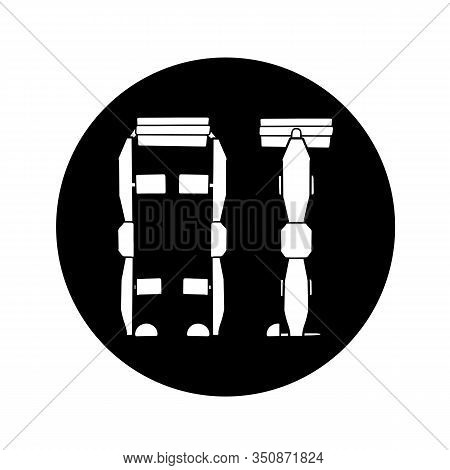 Silhouette Of Medical Leg Exoskeleton In Black Circle Isolated On White Background. Help For People 