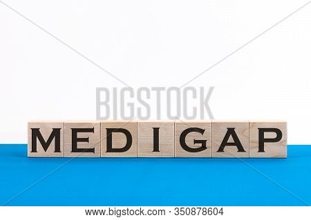 Word Medigap Made With Wood Building Blocks