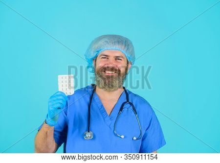 Doctor With Pills. Medicine. Nurse. Package Of Pills. Treatment Pill. Pharmaceutical Drug. Bearded D