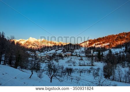 Winter Sunset In The Julian Alps