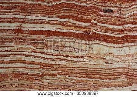 The Texture Of Natural Stones With Beautiful Stripes Of White And Lush Lava Colors Is Called Onice T