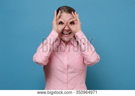 Pretty Girl Holding Fingers Near Eyes Like Glasses. Mask Like Super Hero Or Owl.