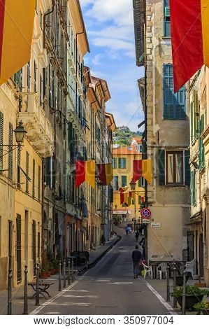 Ventimiglia, Italy - April 22, 2016: Colorful Old Buildings On The Narrow Streets Of A Medieval Town