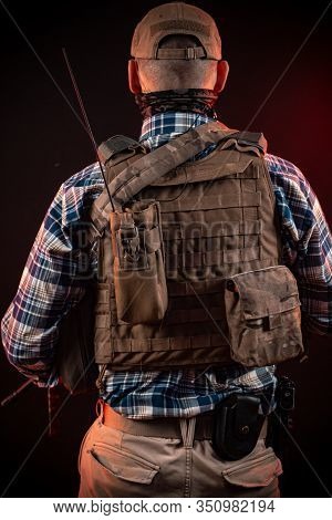 Police Agent In Civilian Clothes And Armor