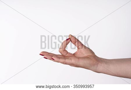 Womans Hand Ok Sign On White Background