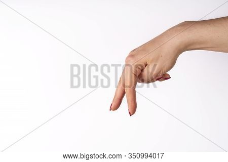 Female Fingers Walking On White Surface With Footsteps Behind It