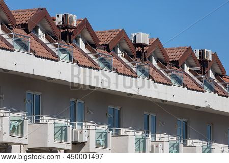 Side; Turkey - February 01 2022:  View Of The Apartment House With A Mansard Roof And Transparent Ba