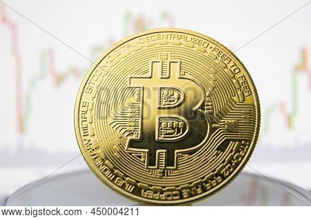 Bitcoin Coin On The Background Of The Chart