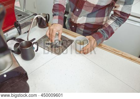 Close-up Of Man Hand Using Rinser Washer