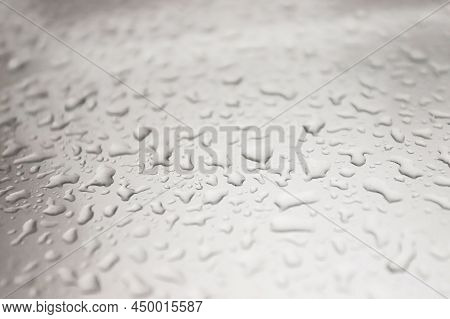 Leaves On The Hood Of A Car In Autumn In Raindrops