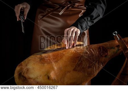 Iberian Ham Cutter. Traditional Spanish Ham, Slicing Of Dry-cured. Hamon Is Forty-eight Weeks Old. G