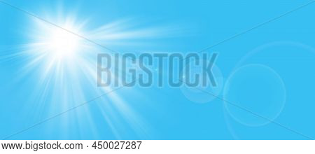 Sunny Background, Sun In Summer On Blue Sky With Lens Flare.
The Sun's Rays And The Lens Light Up In