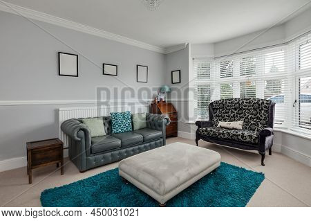 Cavendish, Suffolk - Jan 19 2019: Typical Modern Bedroom With Slatted Wooden Bed And Sidetables With