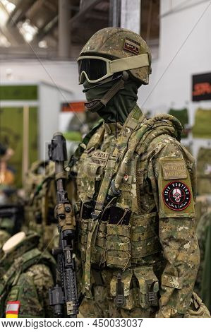 20.02.2022, Russia, Moscow. Stand Camouflage Army Clothing Store For War Games In Peacetime. Mannequ