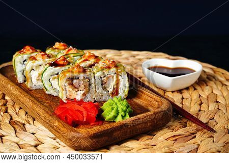 Japanese Rolls With Shrimp Wrapped In Cucumber With Sauce Sushi Close Up