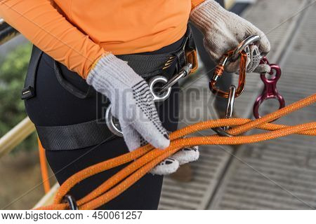 Rappel Practitioners Preparing The Equipment To Perform The Activity Next.