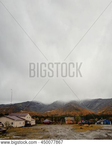 A Gray Autumn Day At The Kss Base In The Khibiny. Houses And Cars Against The Backdrop Of Autumn Mou