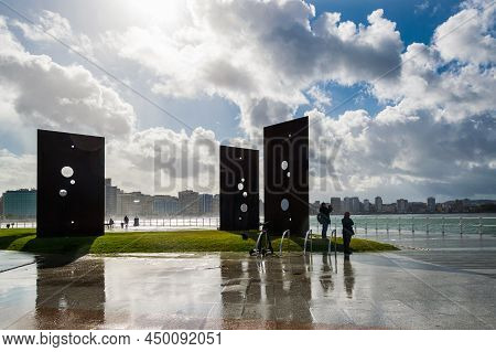 Gijon, Asturias, Spain - 15 Oct 2020: Sombras De Luz Sculpture On Gijons Promenade.