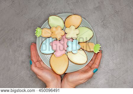 Beautiful Glazed Easter Cookies On Grey Concrete Background. Easter Festive Table Setting. Homemade 