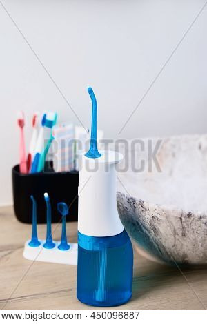 Blue Home Oral Irrigator Kit In Bathroom, Waterpik For Teeth Cleaning, Portable Water Flosser For De