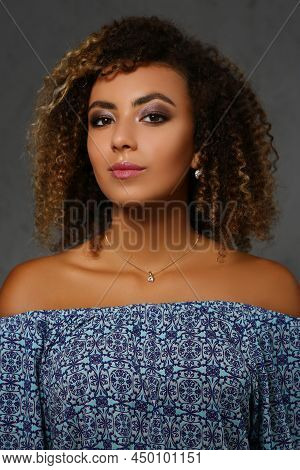 Portrait Of Beautiful Young Latin Lady, Wavy Hairstyle, Professional Studio Photoshot. Girl Model Wo
