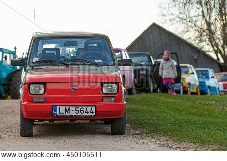 Madona, Latvia - May 01, 2021:  Row Of Colorful Stylish Vintage Fiat 126 Pancars Rental Cars, Pancar