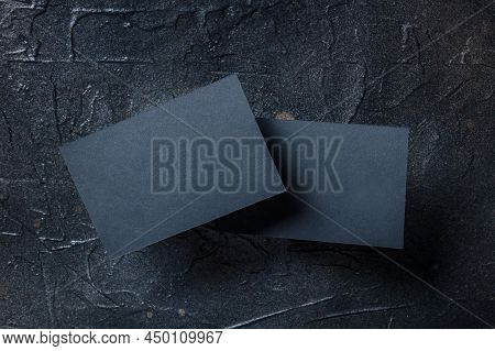 Black Business Card Mockup, Front And Back, On A Dark Background, A Template For Design Presentation