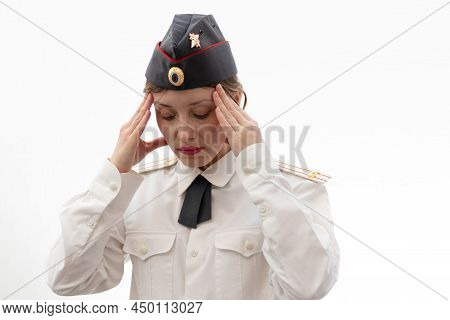 A Beautiful Young Female Russian Police Officer In Dress Uniform In A Cap And Shoulder Straps Of A L