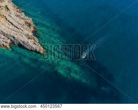 Picturesque Sea Adriatic Coast Of Montenegro. Turquoise Mediteran Sea And Rocky Shore With Evergreen
