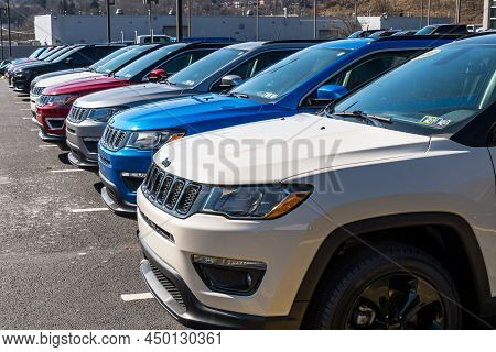 Monroeville, Pennsylvania, Usa February 27, 2022 Used Jeep Vehicles For Sale Line Up At A Dealership