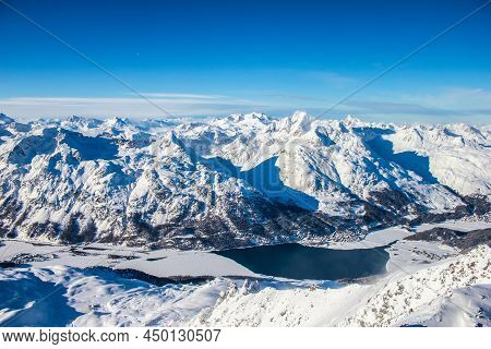 View Of Silvaplana And The Frozen Silvaplanersee From The Mountains Above In The Winter, Switzerland