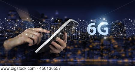 6g Network Internet Mobile Wireless Business Concept. Hand Touch White Tablet With Digital Hologram 