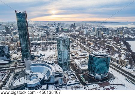 Yekaterinburg Aerial Panoramic View In Winter At Sunset. Yekaterinburg City And Pond In Winter.