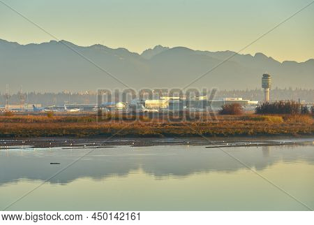 Richmond, British Columbia, Canada - October 16, 2018 Sunrise Mist Vancouver International Airport. 