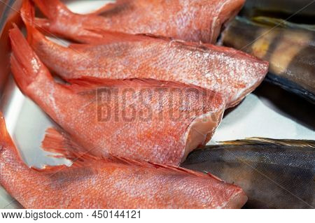 Fresh raw greenling fish and sea bass fish in the supermarket