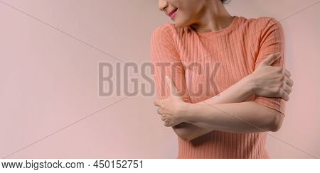 Love Yourself Concept. Smiling Female Embracing And Hugging Herself.  Positive Mind. Wellbeing Menta
