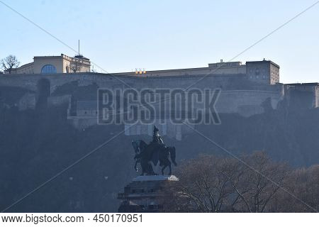 Koblenz, Germany - 02 27 2022: Side View Of The Kaiser Wilhelm Statue With Festung Ehrenbreitstein