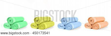 Colorful Rolls Of Garbage Trash Bin Bags Isolated On White Background