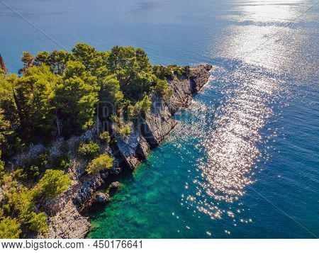 Picturesque Sea Adriatic Coast Of Montenegro. Turquoise Mediteran Sea And Rocky Shore With Evergreen