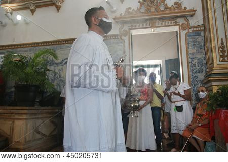 Salvador, Bahia, Brazil - December 13, 2021: Faithful Celebrate Santa Luzia Day - Patron Of Ophthalm