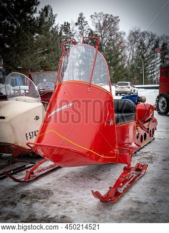 Nisswa, Mn - 5 Jan 2022: Red Antique Polaris Sno-traveler Snowmobile.