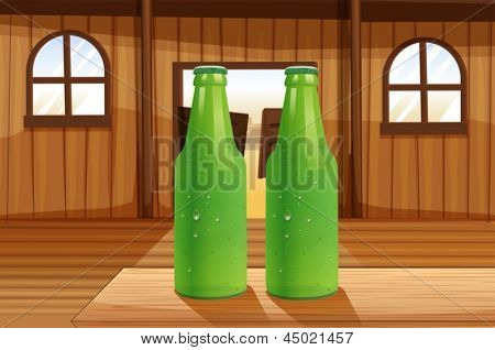 Ilustracja dwóch zielonych butelek powyżej tabeli