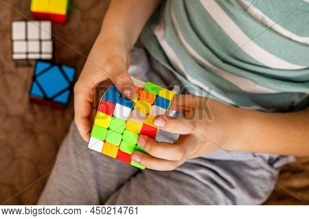 Closeup Hands Male Teenager Assembling Rubiks Cube Multicolored Logical Puzzle Brainstorming