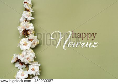 Sprigs Of The Apricot Tree With Flowers On Green Background Text Happy Nowruz Holiday Concept Of Spr