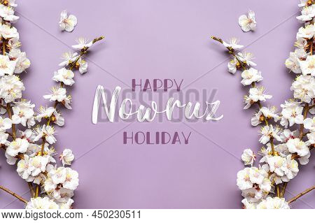 Sprigs Of The Apricot Tree With Flowers On Pink Background Text Happy Nowruz Holiday Concept Of Spri