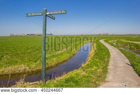 Bicycle Path With A Road Sign In Groningen Province, Netherlands
