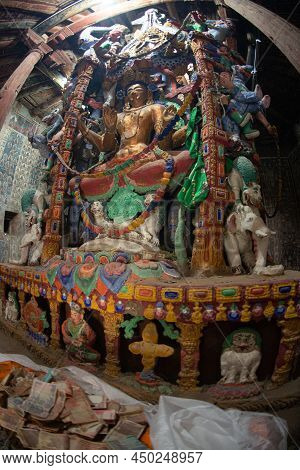 Ladakh , India- May 15,2019 : A Large Buddha Image Or God Made Of Wood. Located Inside Alchi Monaste