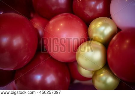 Background Red And Gold Balloons Close-up. Aerodesign.